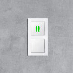 Symbollicht_WC_grün_frontal_2er_System_M_weiß